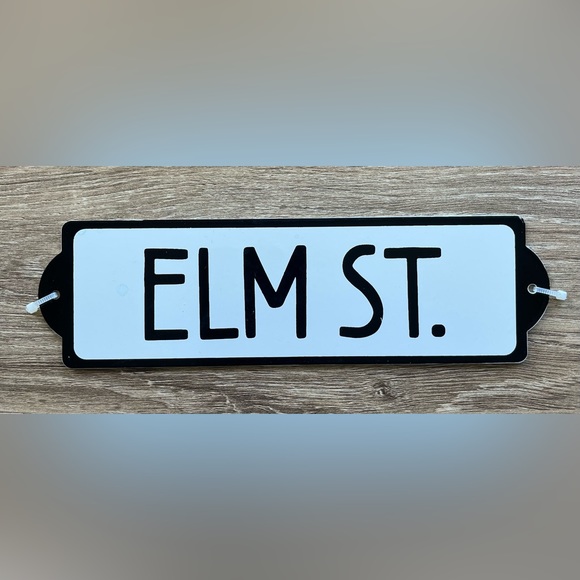 Spencer Gifts Other - NWOT Nightmare on ELM ST. White Metal Black Letters Tin Sign 7.75” x 2.25”